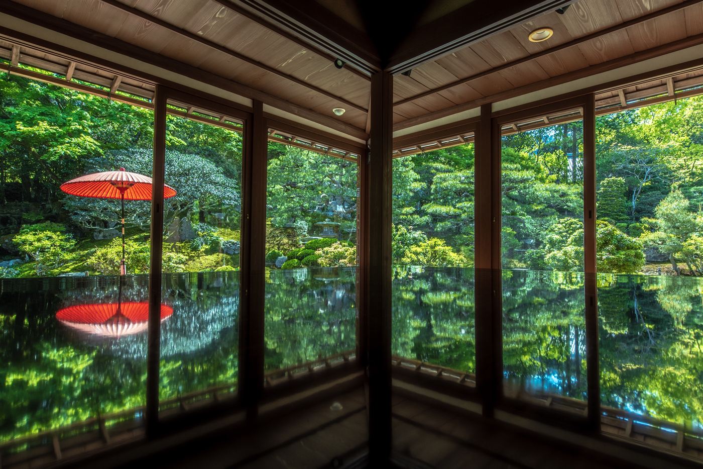 The still, mirror-like room of Kyu Chikurin-in looking out over its garden, Sakamoto, Otsu